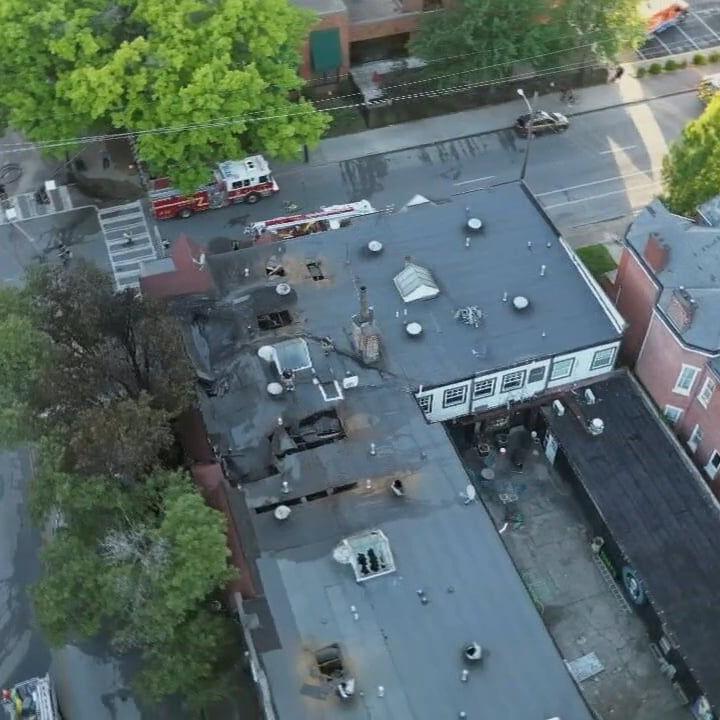 1 person dead after car crashes into tree, causes building in old Louisville to catch fire